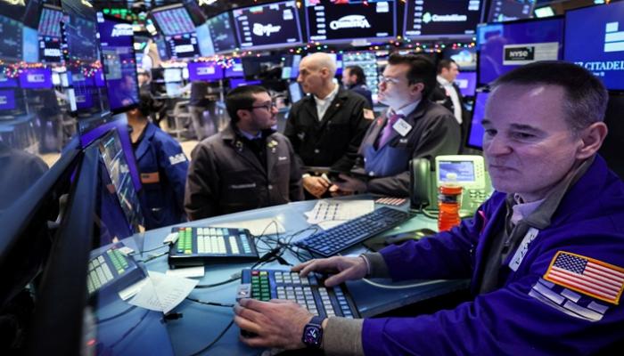 ترقب وحذر في وول ستريت وسط إشارات متناقضة من الاقتصاد